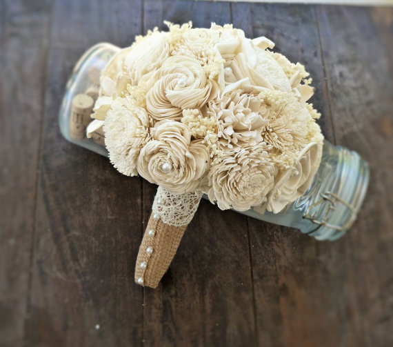 sola wedding bouquet wrapped in burlap