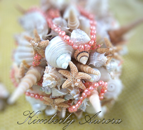 starfish and seashell wedding bouquet | via starfish wedding ideas: https://emmalinebride.com/beach/starfish-wedding-ideas/