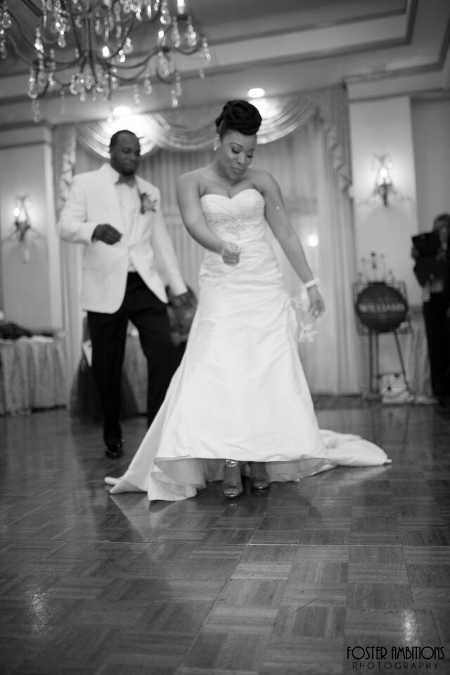 the bride and groom dancing