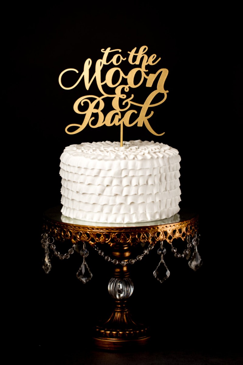 to the moon and back | cake toppers via https://emmalinebride.com/decor/statement-cake-toppers/