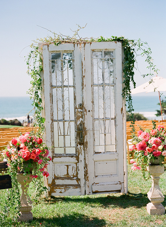 wedding ceremony backdrop with doors outdoor wedding | Ceremony Backdrops Doors | photo: John Schnack