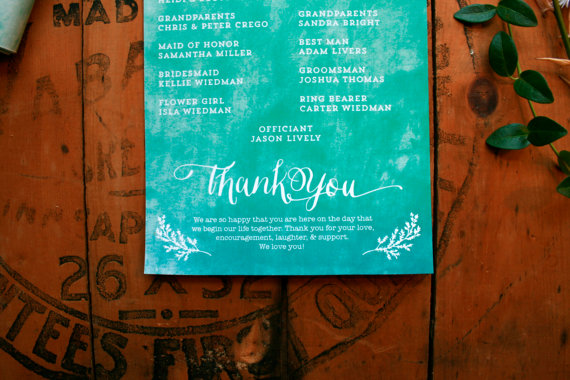 bottom of blue wedding programs with thank you