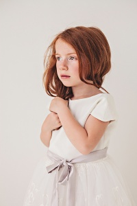 white lace flower girl dress with purple bow sash