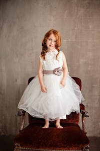 white lace flower girl dress with purple sash