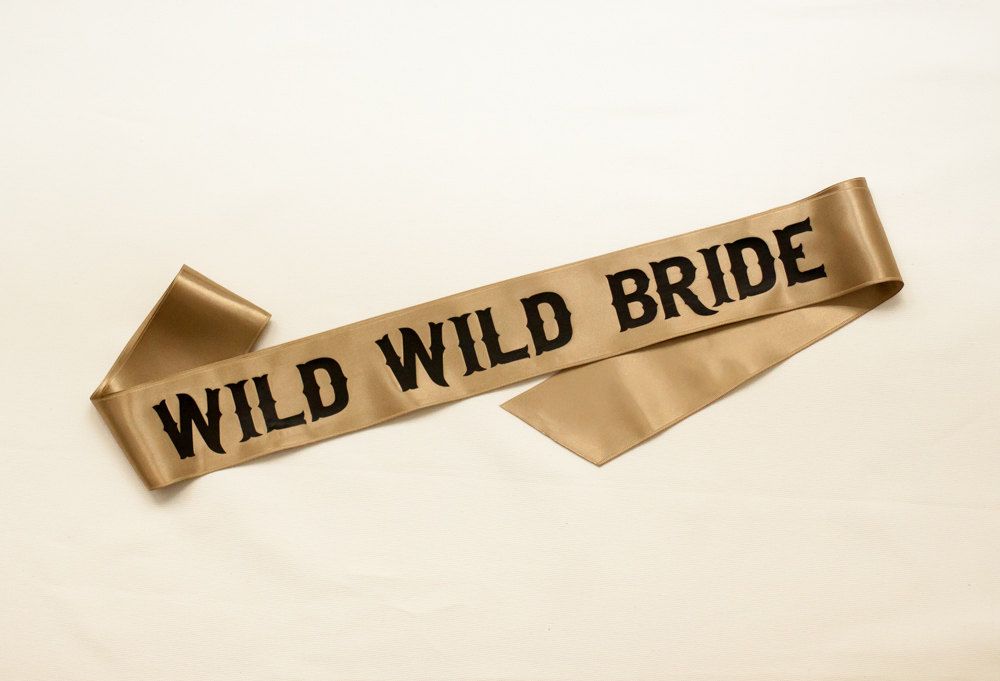 wild wild bride sash | stylish bachelorette sash ideas | via https://emmalinebride.com/bride/bachelorette-sash-ideas/