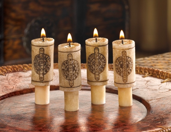 wine cork candles set via DIY Wine Bottle Candles